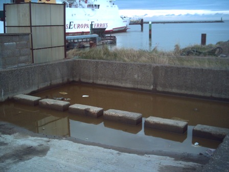 Lorry Bund full of oil and water